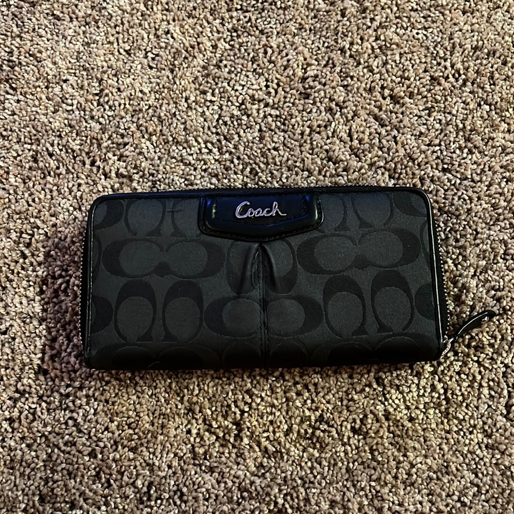 Black coach wallet, good condition, slight wear on inside card holder